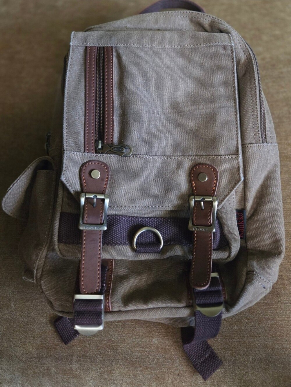 Canvas Travel Sling Backpack with Brown Accents